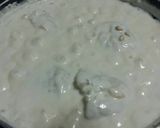 Foto del paso 8 de la receta Bacalao con nata, piñones y pasas