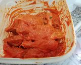 A picture of step 1 of Red chicken authentic.