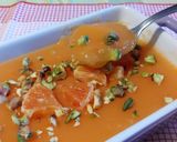 Foto del passaggio 7 della ricetta Gelo alle arance sanguinelle con granella di pistacchio