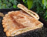 Foto del paso 5 de la receta: Jugoso calzone de humita y cebolla de verdeo