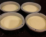 A picture of step 7 of Vanilla Lemon Raspberry Layer Cake with Whipped Cream Buttercream Frosting.