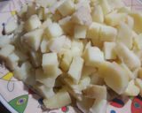 A picture of step 3 of Aaloo anday.
