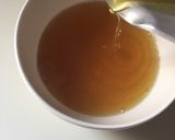 A picture of step 3 of Orange ice tea.