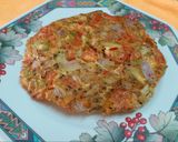 A picture of step 3 of Onion Tomato Egg Omelette.