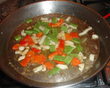 Foto del paso 3 de la receta: Paella de calamares con su tinta