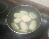Foto del paso 2 de la receta Pechuga de pollo adobada al ajillo a la plancha con menestra de verduras y papas cocidas