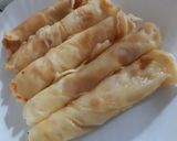 A picture of step 4 of Pancakes roll with cream.