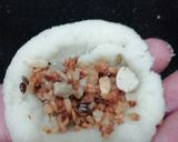 A picture of step 8 of Kakara Pitha.