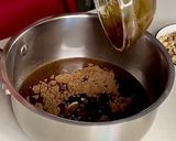 A picture of step 2 of Chocolate biscuit cake.