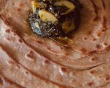 A picture of step 14 of Alu meethi with paratha.