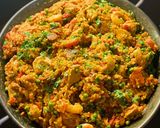 A picture of step 13 of Paella, chicken, chorizo & prawns.
