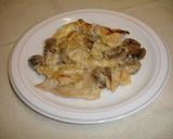 Foto del paso 12 de la receta Lonchas de pollo, champiñones y salsa de bechamel