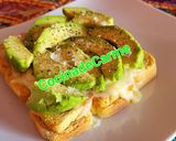 Foto del paso 6 de la receta: Tosta de minitostas con queso, jamón y aguacate