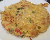 Foto del paso 4 de la receta: Tortilla de patata, cebolla, pimiento rojo y verde