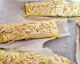 Foto del paso 6 de la receta: Cañas de hojaldre rellenas de turrón de chocolate y mermelada de naranja