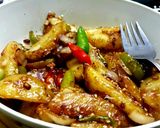A picture of step 2 of Chilli garlic potatoes.