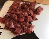 Une image de l'étape 1 de Boeuf aux épices,cacahuètes et lait de coco.