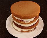 A picture of step 23 of Vanilla Lemon Raspberry Layer Cake with Whipped Cream Buttercream Frosting.