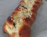 Foto del paso 7 de la receta Trenza brioche de crema y pepitas de chocolate con conitos de hojaldre