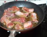Foto del paso 4 de la receta Costillas de cerdo con patatas paja al ajillo