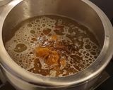 A picture of step 4 of Meva rice (jaggery) (dry fruits rice).