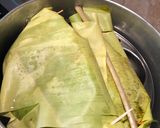 A picture of step 11 of Meen Pollichathu- Kerala style fried fish steamed in banana leaf.