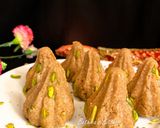 A picture of step 6 of Nolen Gurer Millet Oats Modak.
