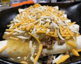A picture of step 7 of Beefy Poblano Enchiladas.