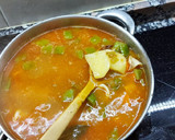 Foto del paso 6 de la receta: Guisado de calamarcitos y patatas