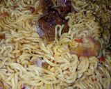 A picture of step 2 of Noodles jollop with daddawa 2.