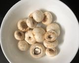 A picture of step 1 of Stuffed mushrooms.