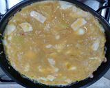 A picture of step 6 of Spanish Omelette with Goat Cheese and Caramelized Onion.