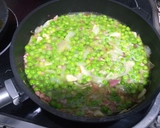 Foto del paso 3 de la receta: Salteado de guisantes con jamón y huevo