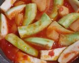 A picture of step 4 of Trombetta Squash with Tomato and Potatoes.