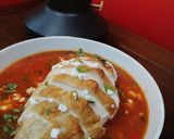 A picture of step 7 of Mexican tomato, chicken and refried bean soup.