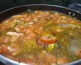 A picture of step 4 of Hilsa haldi pani.