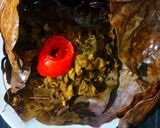 A picture of step 4 of Chhatu Patra Poda/ Baked Mushroom in a traditional way.