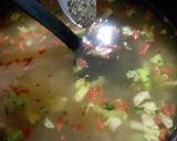 A picture of step 5 of Chicken soup with garlic bread.