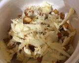 A picture of step 4 of Cheesy fries on the stove.
