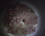 A picture of step 2 of Aloo Qeema.