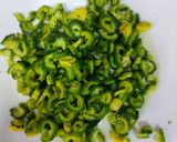 A picture of step 1 of Bitter gourd with onion masala.