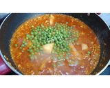A picture of step 2 of Chicken Mince with fresh green peas.