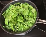 A picture of step 3 of Sautéed garlic spinach.