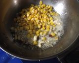A picture of step 2 of Aam Ada Corn Rice.