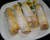 Foto del paso 5 de la receta: Arrolladitos rellenos con dulce hechos con discos de empanadas