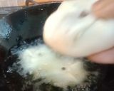 A picture of step 4 of Coconut Lobongo Lotika.