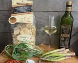 A picture of step 1 of Coast of the Gods biricci con asparagi, pomodori, aglio selvatico e dolcelatte.