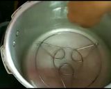 A picture of step 5 of Eggless moist chocolate cake without oven.