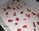 A picture of step 5 of Homemade strawberry ice cream with homemade strawberry sauce.