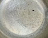 A picture of step 1 of Rava sooji Ladoos.